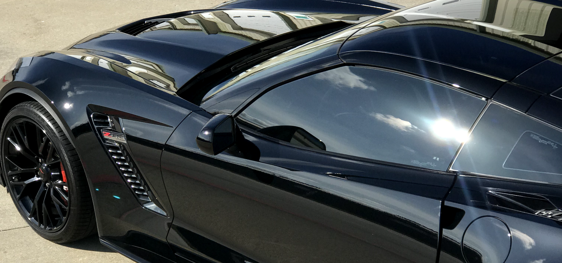 Ceramic coated luxury car in Texas Shine Doctor's Cypress detailing bay